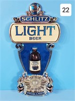 Schlitz Light Plastic Embossed 21" Sign