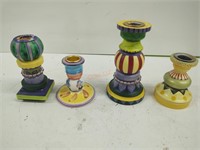 4 colorful candlestick holders 3 are wood