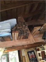 Assorted Wood In Rafters In Garage