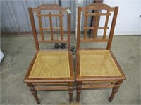 PAIR OAK CARVED CANE SEAT CHAIRS