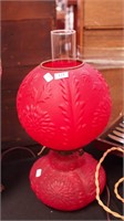 A red satin glass Gone with the Wind lamp