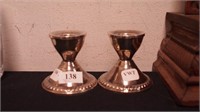 Pair of sterling silver candlesticks, 2 1/4" high