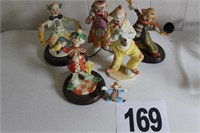 5 clown figurines and 1 small glass clown
