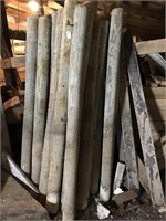 25 Used 6-7' High X 5-6" Round Posts & Contents