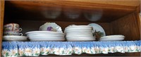 Shelf of collectible plates, Statue of Liberty
