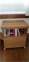 Storage cabinet on casters, books
