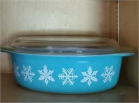 Pyrex teal snowflake covered casserole dish