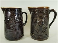 2 antique brown salt glaze pitchers