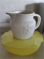 Yellow Pyrex with daisy stoneware pitcher