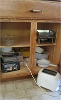 Contents of kitchen cupboard, handy chopper