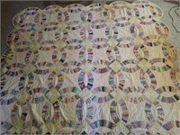 Handmade Wedding Ring Quilt has stains