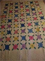 Handmade Flower Applique Quilt has a small stain