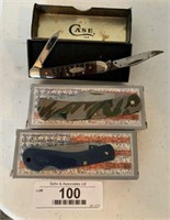 Three Pocket Knives and Case
