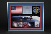 Space Shuttle Discovery Flown Flag and Patch. 2009
