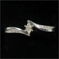 10K White gold marquise cut diamond solitaire in