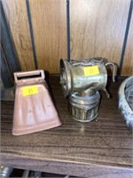 Cowbell and carbide lantern