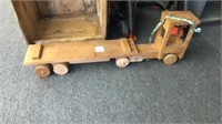 handmade wood trucck and trailer missing a wheel