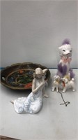 wood plate and poodle and lady