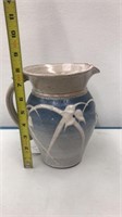 blue pottery pitcher