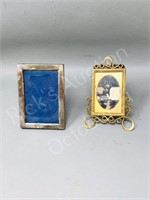 1 sterling & 1 brass mini picture frames -