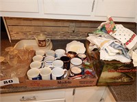 Mugs, glassware, towels, teapot, casserole carrier