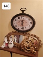 Smithson's Oval Wall Clock, Etc. on Shelf