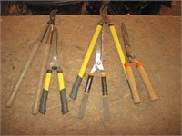 Lot of Trimmers / Pruners in Barn
