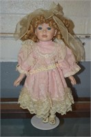 Porcelain Doll on Stand