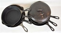EIGHT PIECES OF ANTIQUE CAST IRON COOKWARE