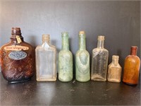 Antique Whiskey & advertising bottles