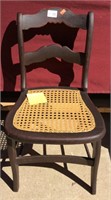 Antique Caned Black Walnut Child’s Chair