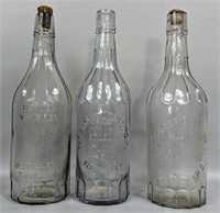 Three Antique Hayner Whiskey Bottles