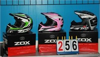 THREE(3) ZOX YOUTH LARGE HELMETS