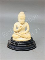 Ivory carved Buddha on stand