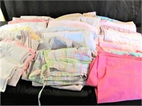 25 Pairs of Capri Length Pants Size Lg and XL