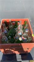 Assorted soda bottles glass