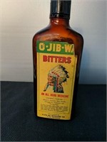 Vintage OJIBWA Indian Chief BITTERS 
brown glass