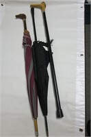 2 Umbrellas & 1 cane/walking stick