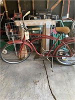 Red bicycle with basket