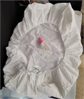 Cotton Mini Crib Mattress Pad and Baby Bottle