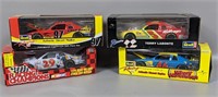 Four 1990's Revell Racing Diecast Cars (1:24