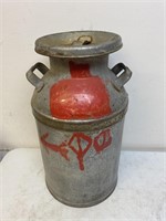 Antique milk can