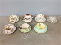cups/ saucers- 7 sets