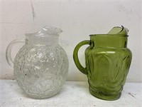Green and clear glass water pitchers