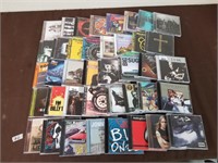 40 CDs mix of rock, blues, and others
