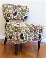 Occasional Chair with Floral Upholstery.