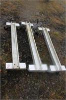 3 ALUMINUM DOLLIES (EACH ARE 4' LONG X 1' WIDE)