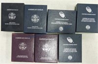 Lot of 7 Silver Eagles: 1986 & 1990 proof,