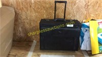 Rolling briefcase with locks