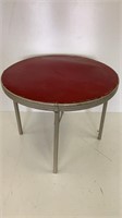 Red metal round folding table